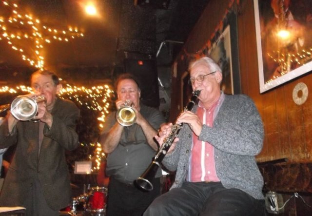withpeterecklundandjoelicarithegrovestreetstompers2012arthurstavernnyc.jpg